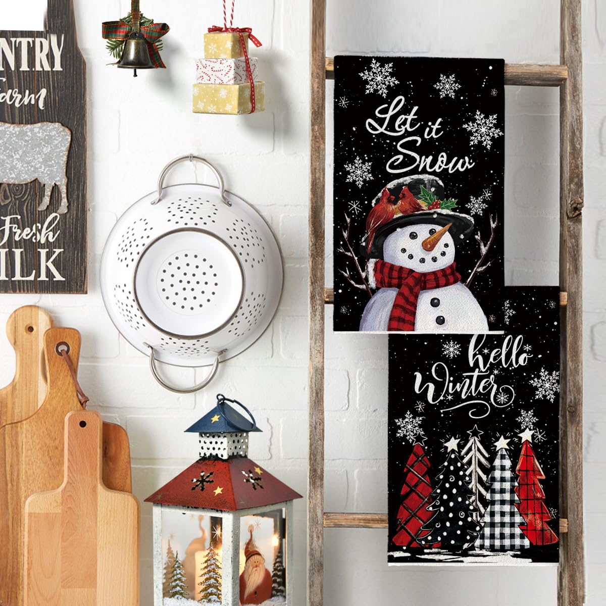 Artoid Mode Christmas decor towels brighten kitchens during routine cleaning.