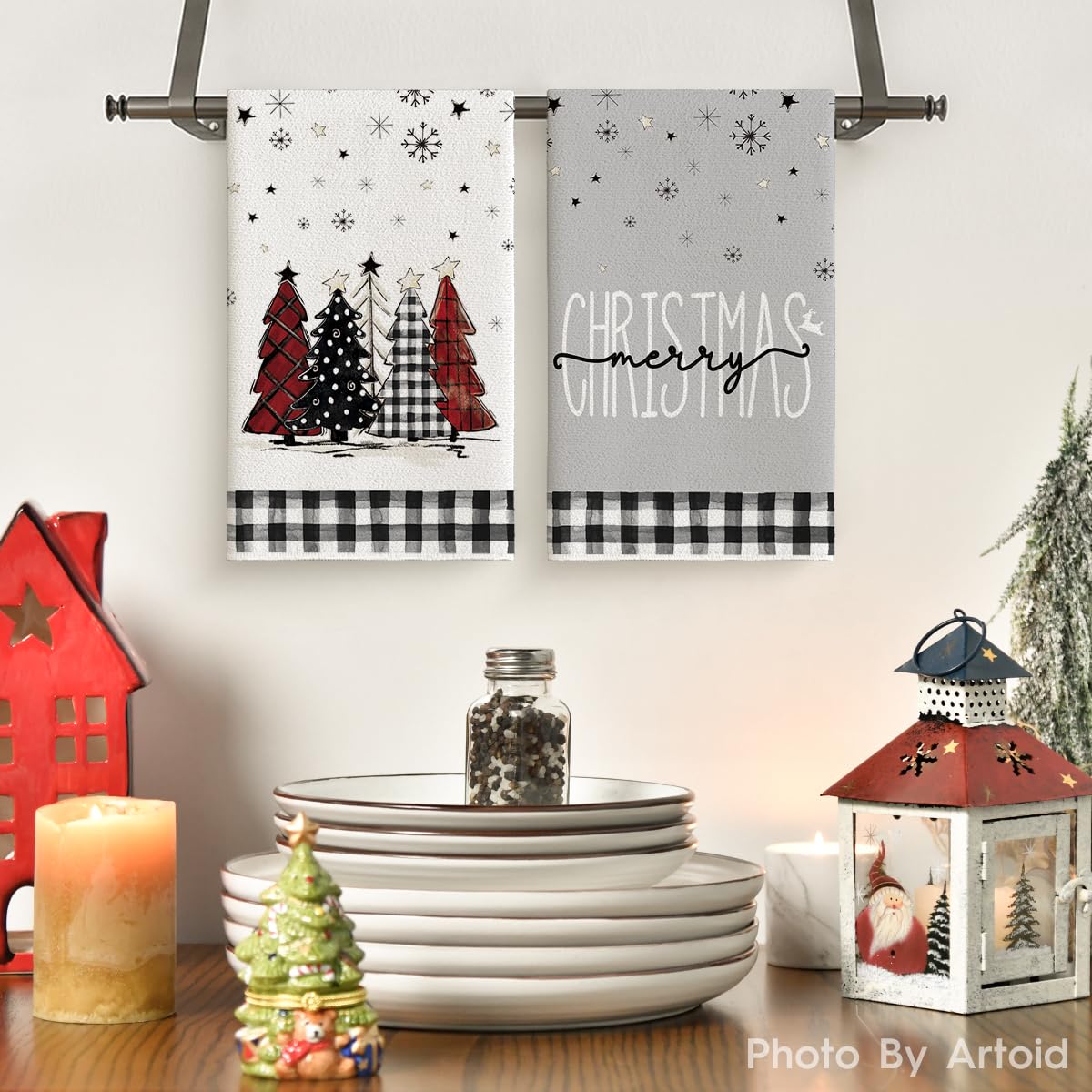 Artoid Mode Christmas trees and stars kitchen towels brighten counters while absorbing spills.