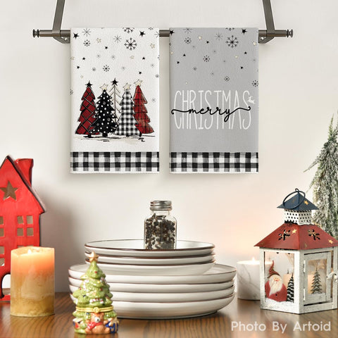 Artoid Mode Christmas trees and stars kitchen towels brighten counters while absorbing spills.