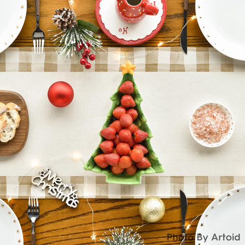 Artoid Mode dining table with holiday decor using the runner