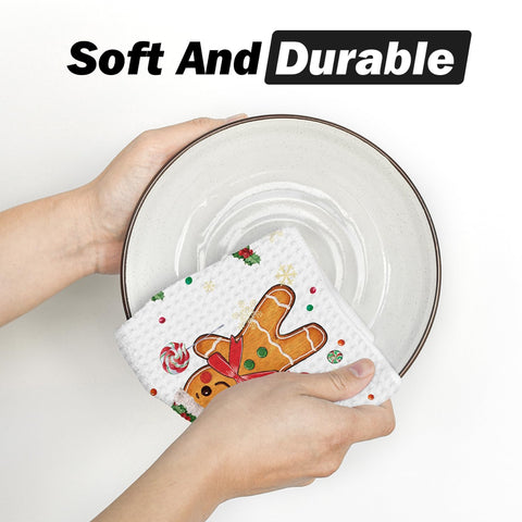 Artoid Mode Gingerbread Candy kitchen towel in use while handling a spill.