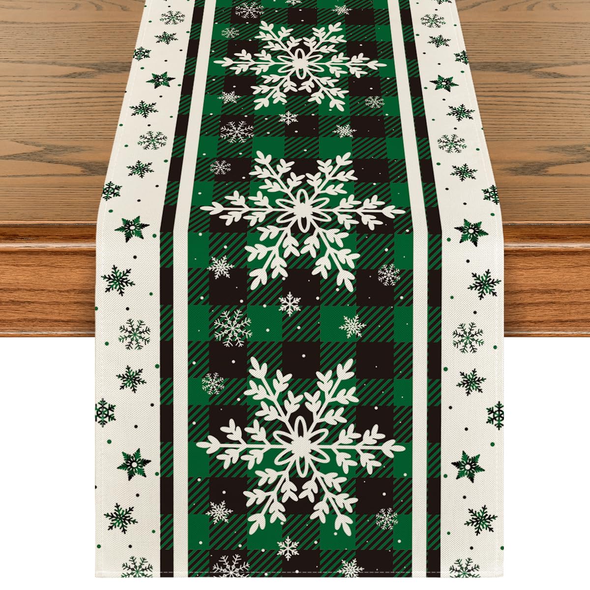 Artoid Mode green buffalo plaid snowflakes table runner enhances festive dining and protects surfaces.