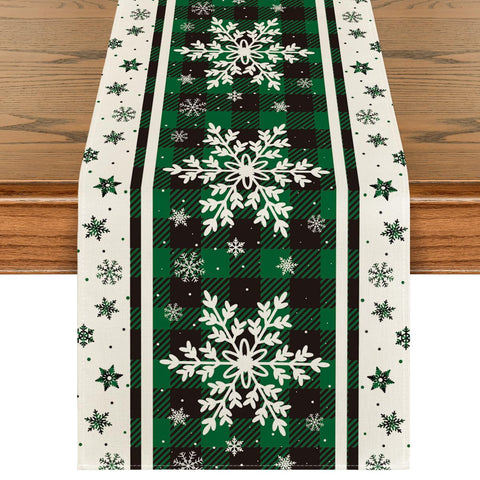 Artoid Mode green buffalo plaid snowflakes table runner highlights festive dining ambiance and surface protection.