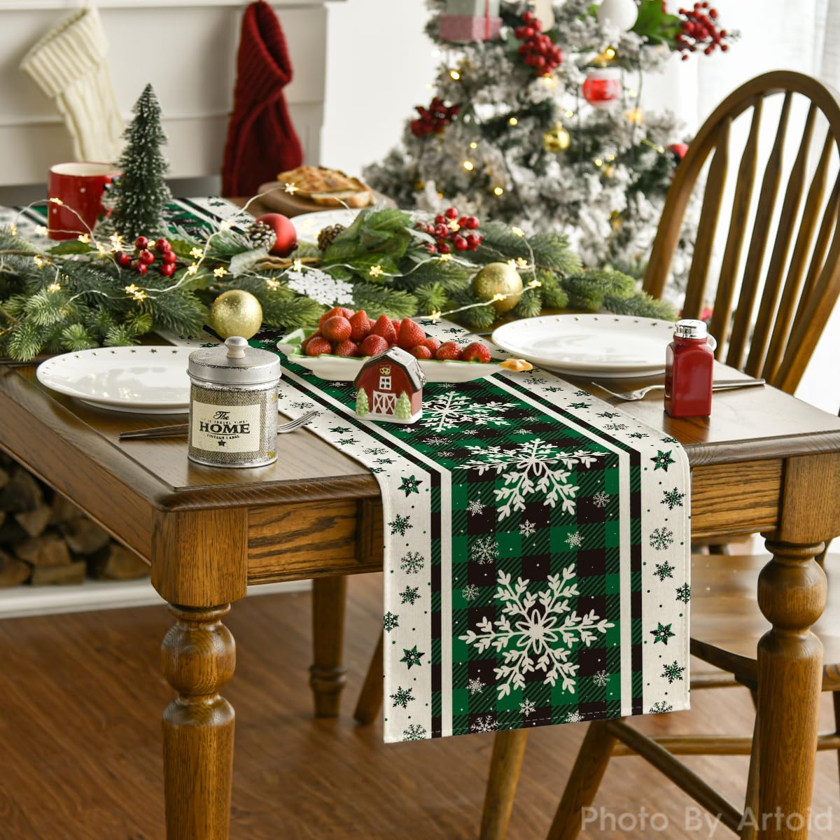 Artoid Mode table runner with snowflakes provides durable decor for winter meals and gatherings.