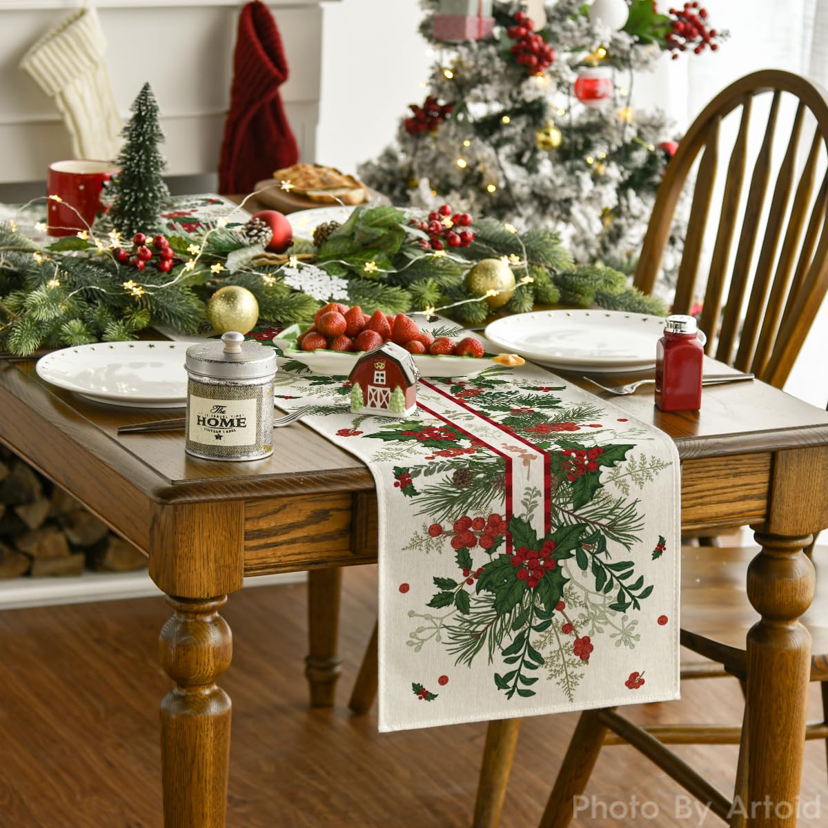 Artoid Mode holly pine cone leaves floral runner adding color to a Christmas table