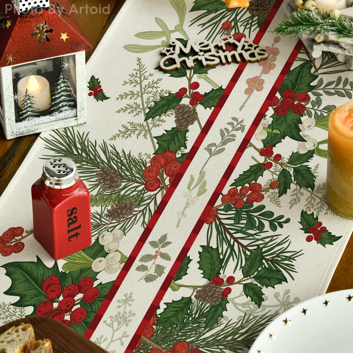 Artoid Mode holly pine cone leaves floral runner shown with candles and greenery