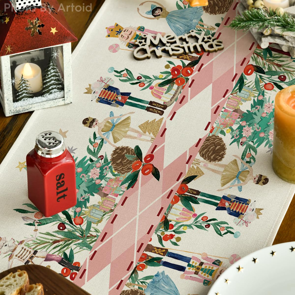 Artoid Mode Nutcracker Floral Holly runner on a table with place settings and decor