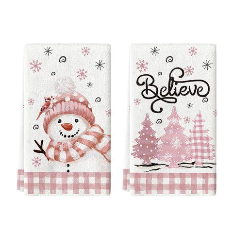 Artoid Mode pink Xmas tree snowman dish towels for quick, gentle drying of cookware.