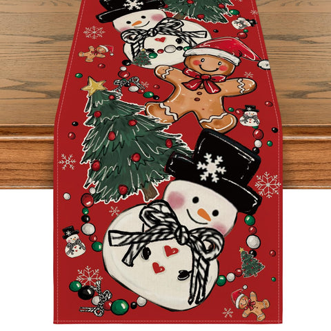 Artoid Mode red snowman gingerbread pine table runner brightens holiday tables