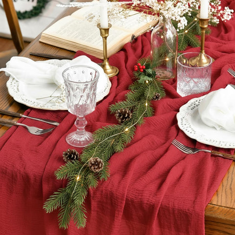 Artoid Mode red wedding table runner adds vibrant holiday ambience to gatherings.