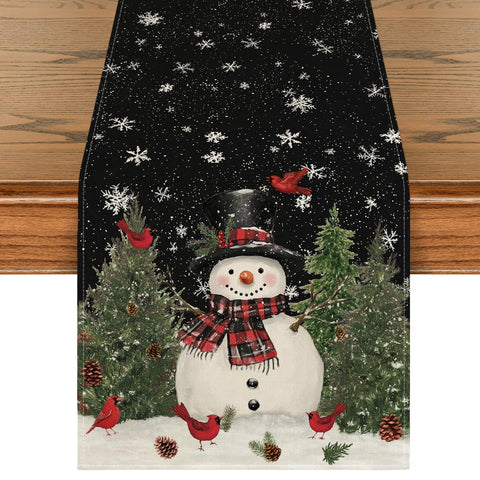 Artoid Mode snowman birds trees table runner boosts festive dining with a durable polyester design.