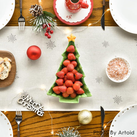 Artoid Mode table runner on dining table adds seasonal charm.