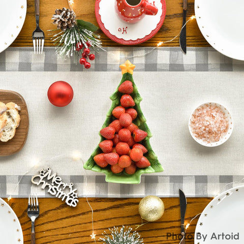 Artoid Mode Waterclor Grey Buffalo Plaid table runner decorates winter gatherings on indoors or outdoor patios.
