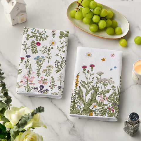 Artoid Mode Wildflower towels in use for drying dishes and wiping surfaces.