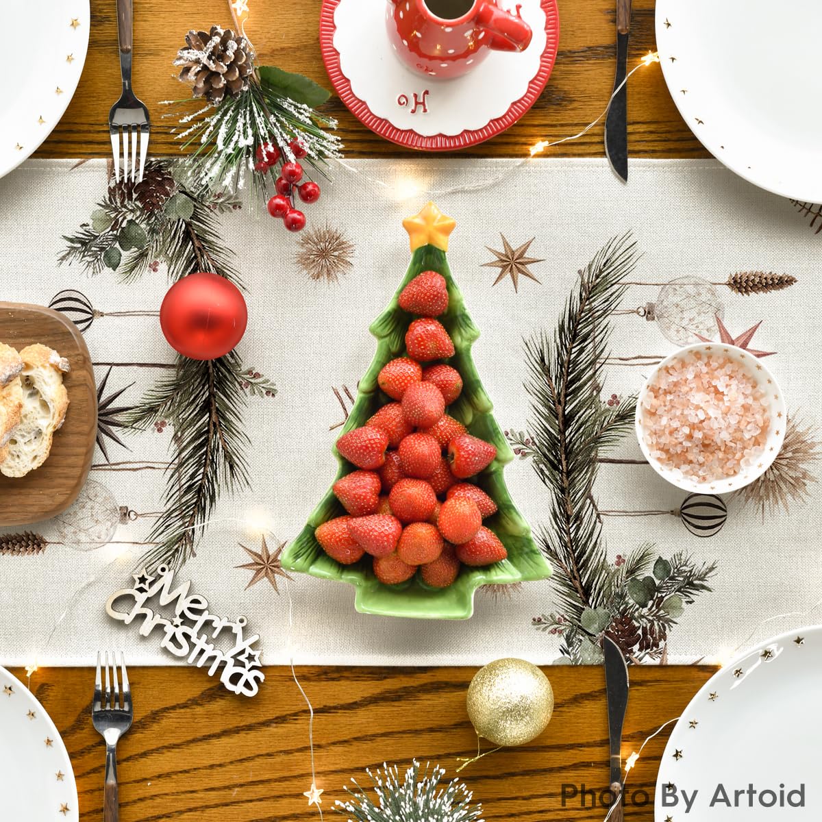 Artoid Mode xmas-trees-holly-pine-cone table runner protects surfaces during meals