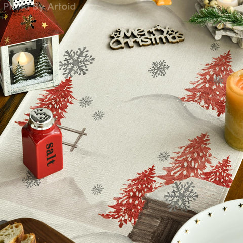 Artoid Mode Xmas Trees Let It Snow table runner on wood surface highlights durable, spill-resistant material.