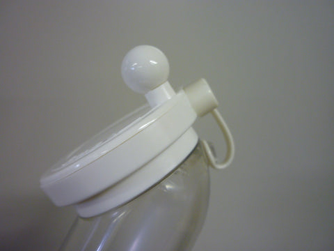 ASVEL sesame grinder white top view highlights small size ideal for countertops