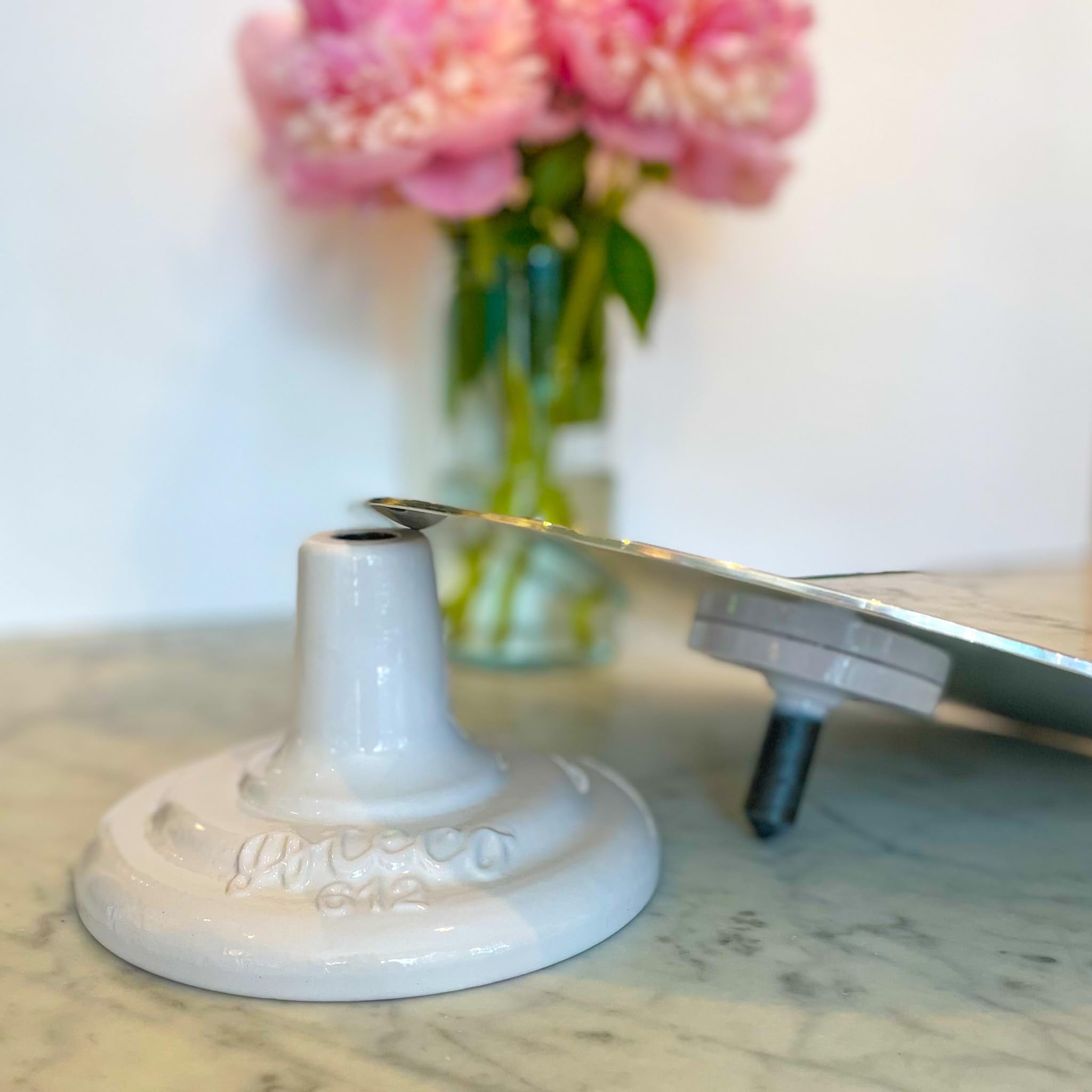 Ateco 12-inch rotating cake stand in action for even icing and piping