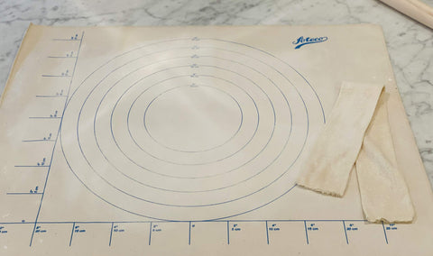 Ateco canvas pastry cloth showing silk-screened concentric circles for dough sizing.