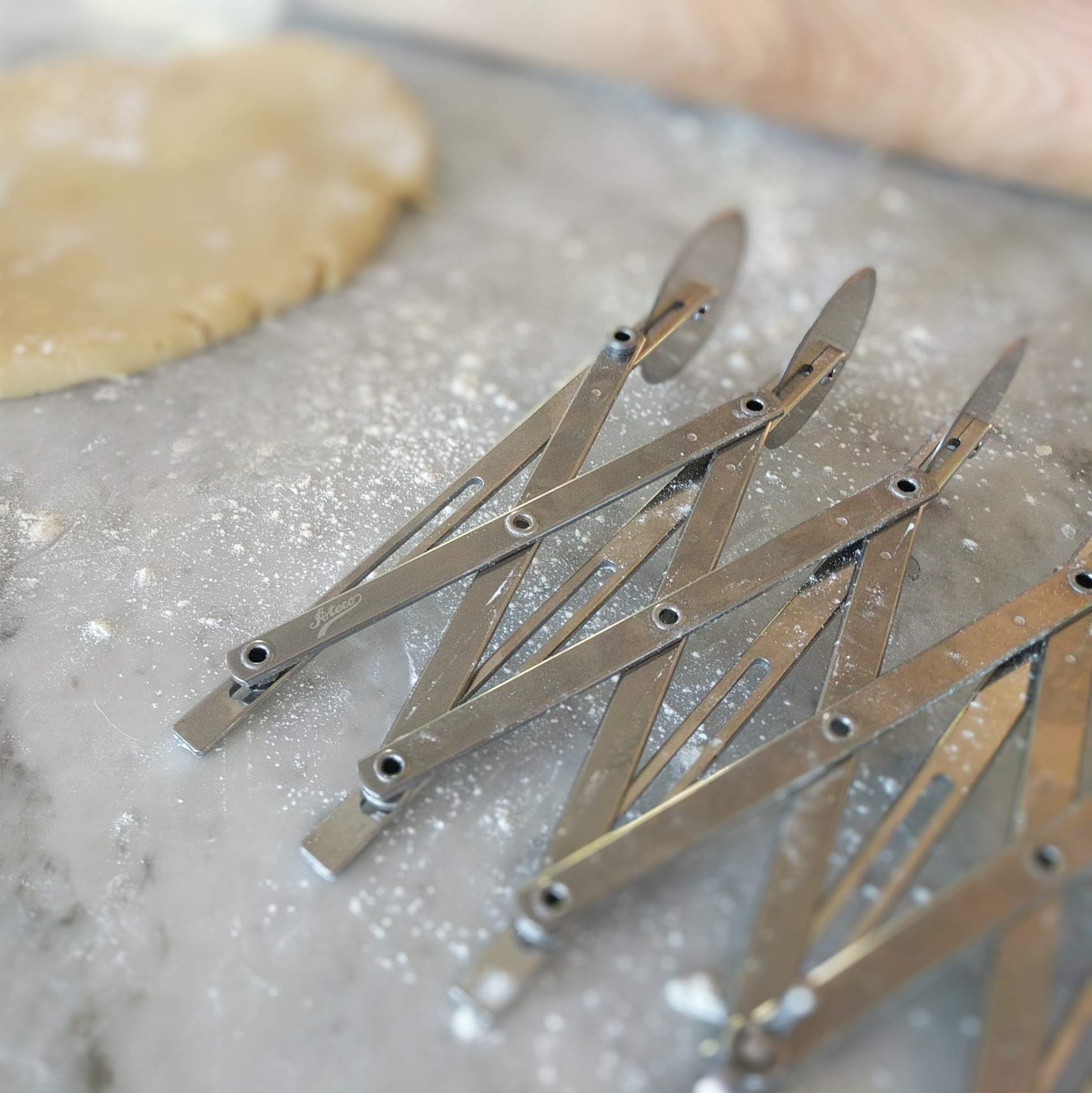 Ateco stainless steel construction highlights durability for kitchen use.