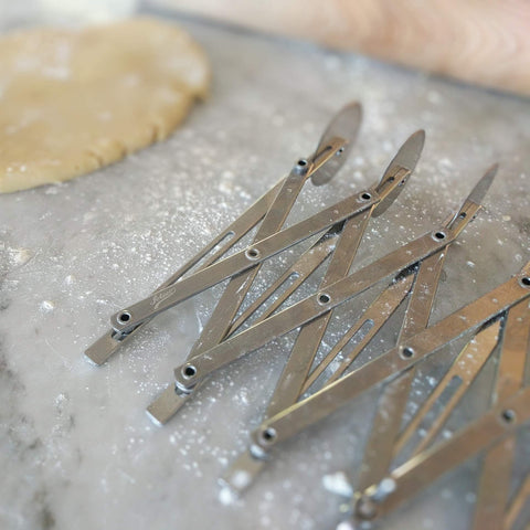 Ateco stainless steel construction highlights durability for kitchen use.