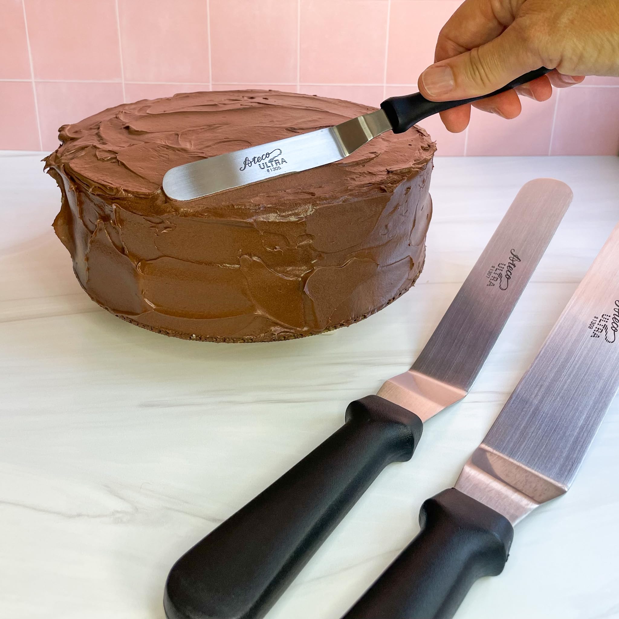 Ateco Ultra Offset Spatula 4.25 x 0.75 inch blade in use for precise tasks.