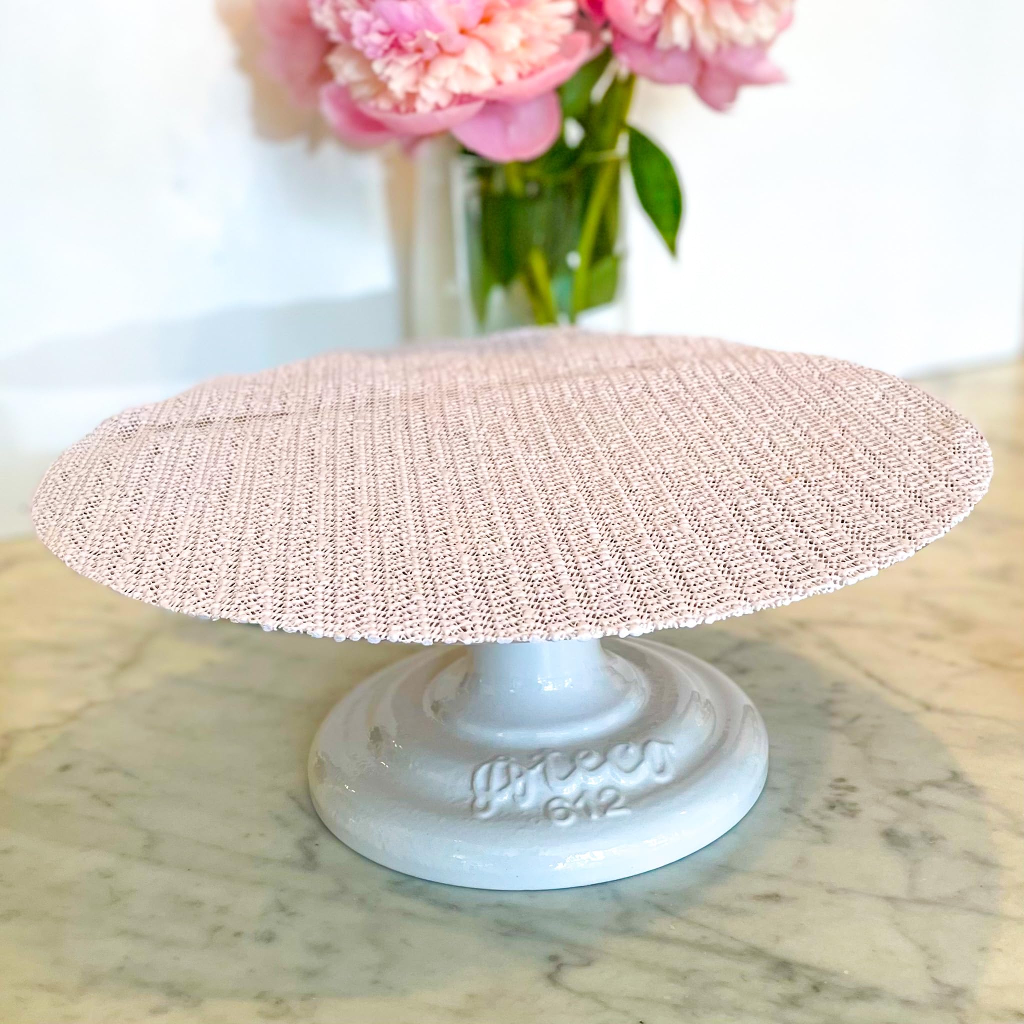 Ateco white cake stand showcasing pastries with a professional look
