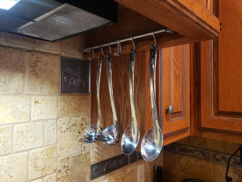 Audmore storage solution for pots, pans, spatulas, measuring cups and mugs.