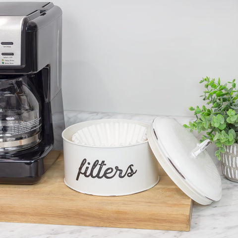 AuldHome Design filter storage on shelf enhances farmhouse aesthetics and organization.