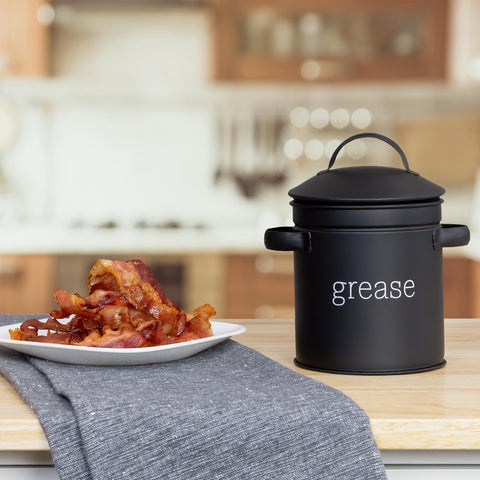 Close-up of enamel finish and lid on grease container