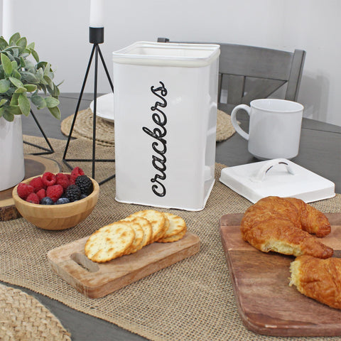 AuldHome white enamelware cracker tin on a counter for organized snacks.