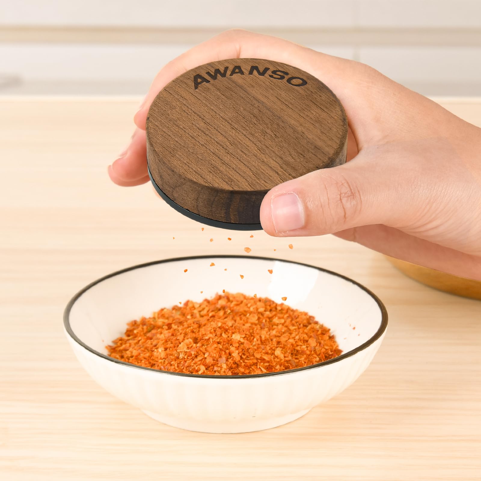 Awanso walnut-aluminum blend grinder combines natural and modern materials.