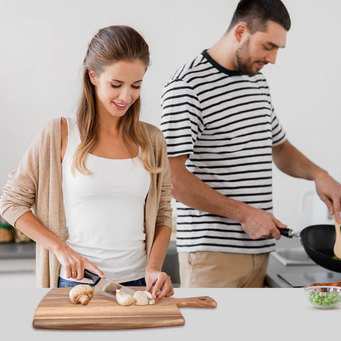 Ayiaren cutting board with handle transfers easily from counter to table.