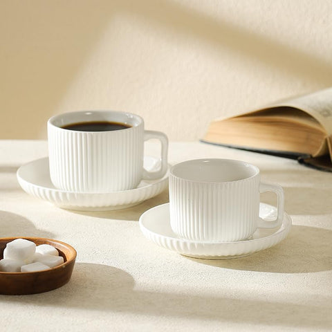 AYUCIA white-cream cup and saucer pair ideal for latte and cappuccino rituals.