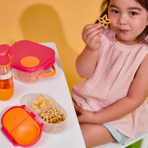 b.box Snack Box with two compartments keeps snacks neatly separated for kids.