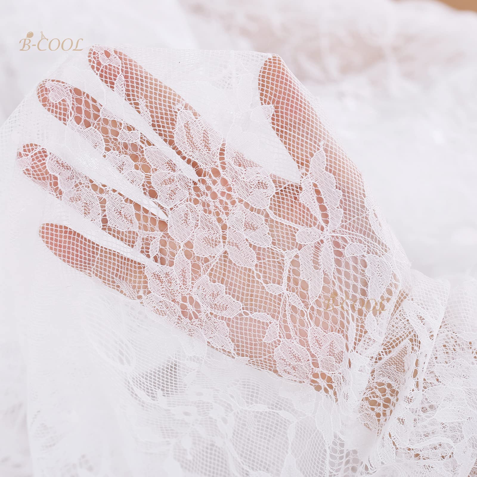 B-COOL lace tablecloth shows scalloped edges for refined charm