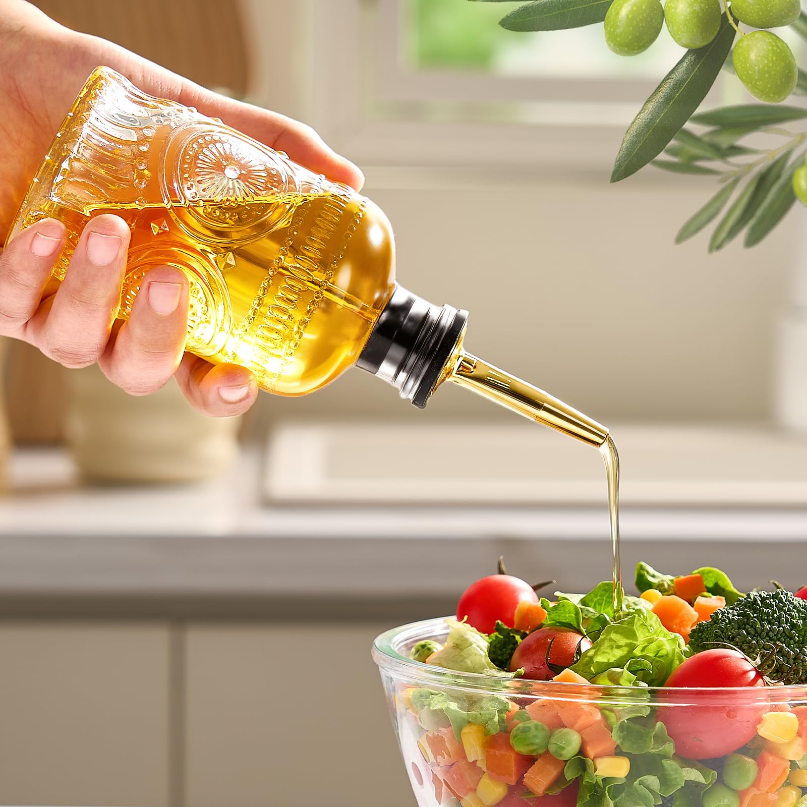 Baalaka oil bottle with metal pour spout for controlled flow and less mess.