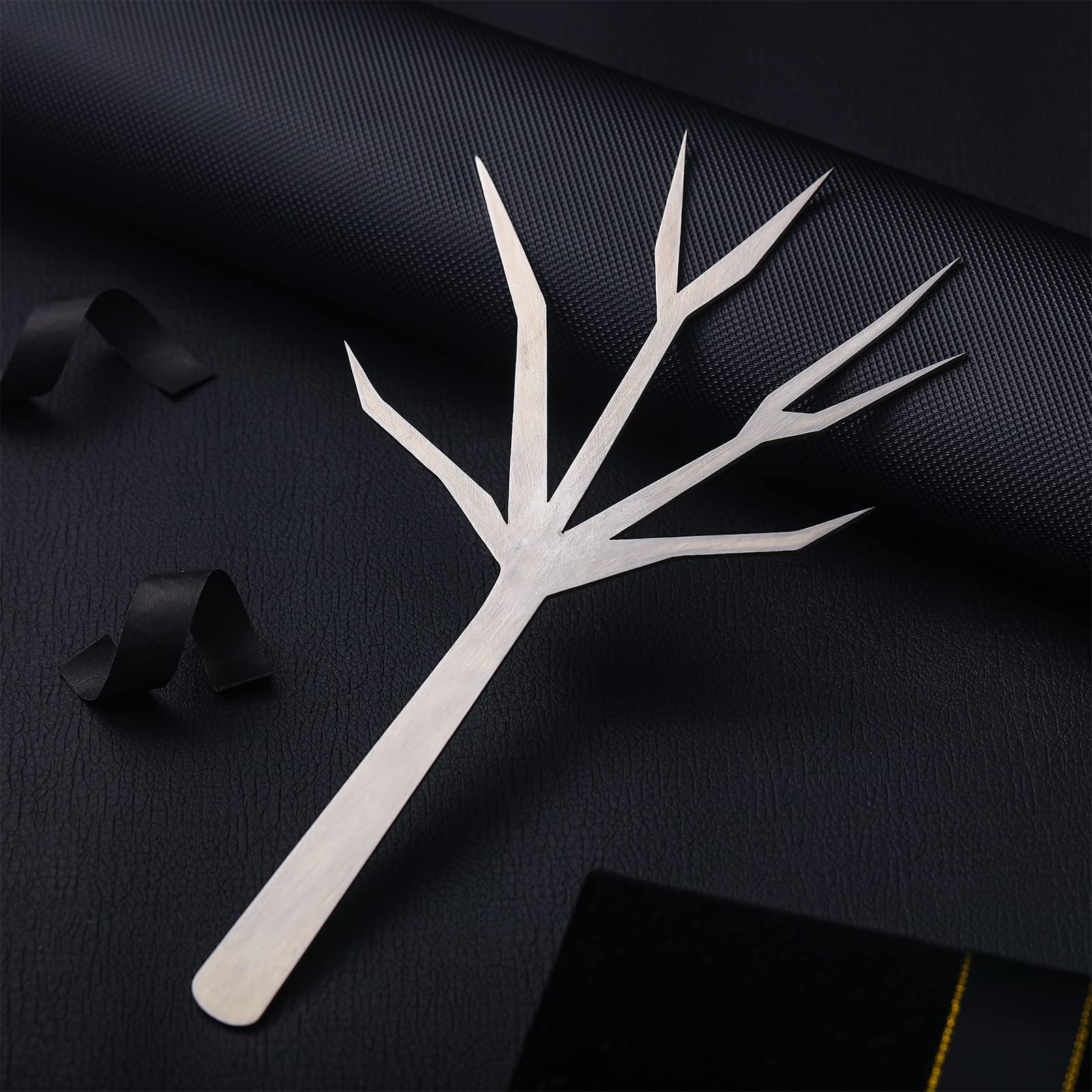 Baderke garnish sticks for cocktails showcase fruit and olives with a stylish branch motif.