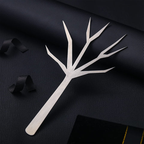 Baderke garnish sticks for cocktails showcase fruit and olives with a stylish branch motif.