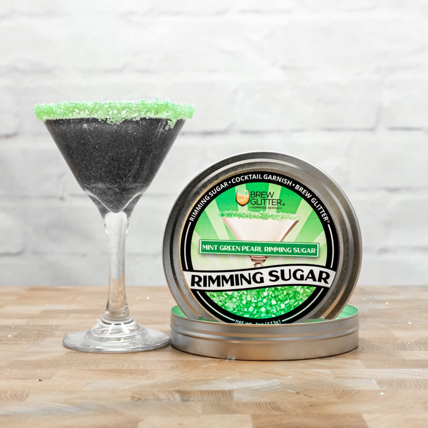 Closeup of Bakell Brew Glitter Mint Green sparkle on glass rim.