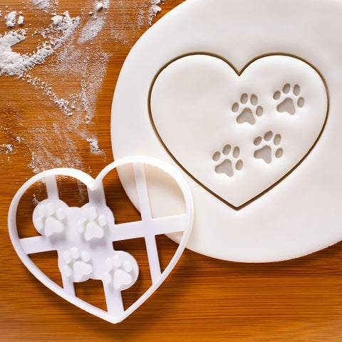 Bakerlogy Heart Paw Prints Cutter with fondant detail for decorative treats.