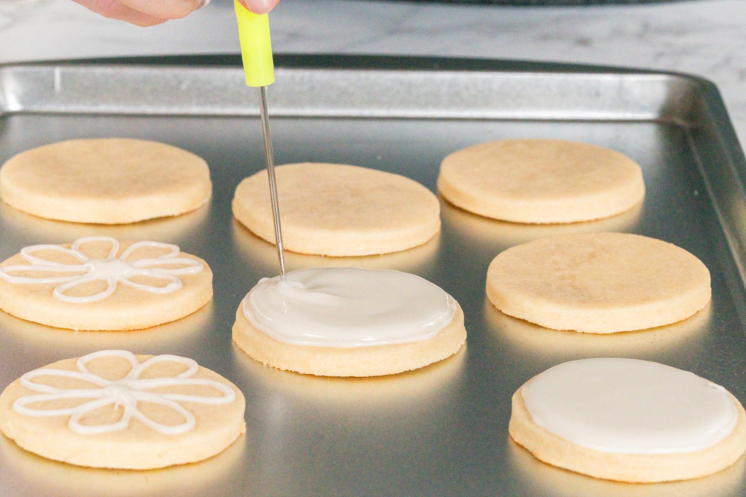 Bakerpan decorating tips and bag clamps for clean icing lines