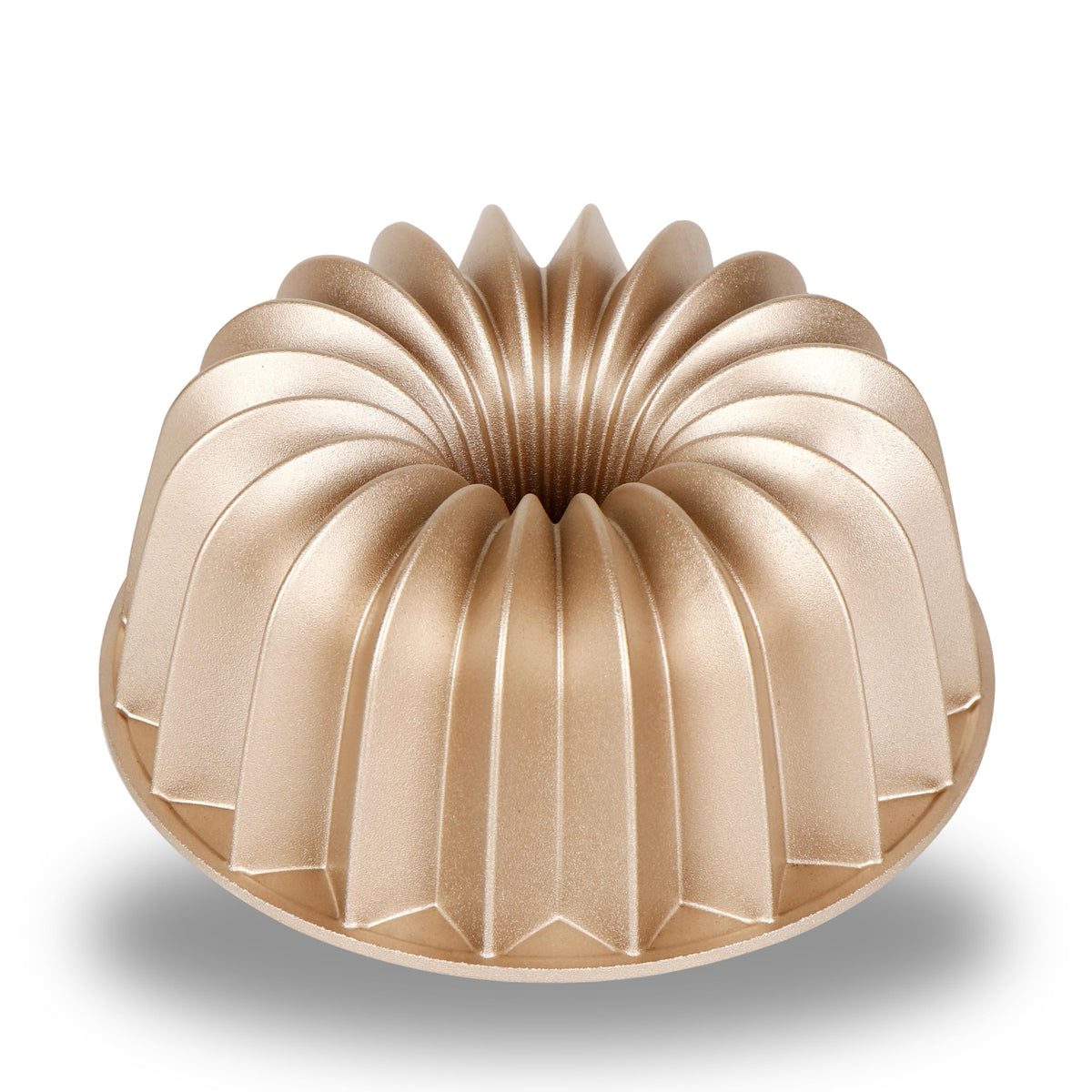 Baker's Secret fluted cake pan showing 9.7 cup capacity for large batches.