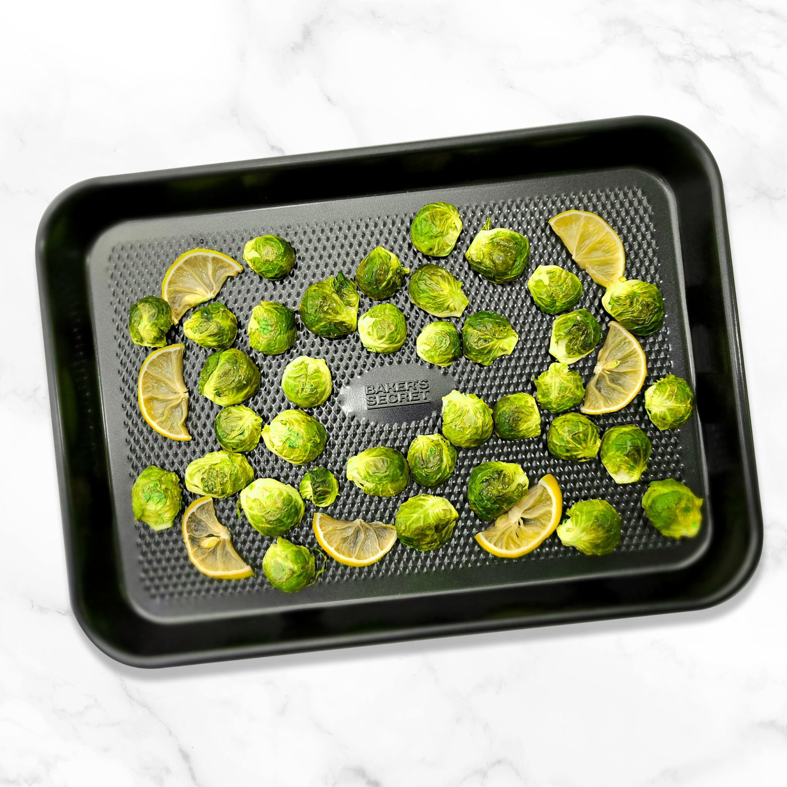 Baker's Secret 3-piece baking set covers small to large sheet needs.