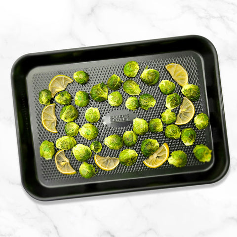 Baker's Secret 3-piece baking set covers small to large sheet needs.