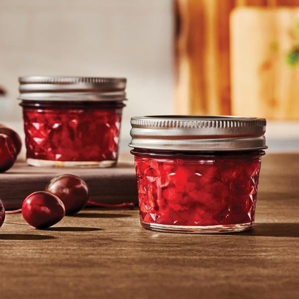 Ball jar filled with jam ready for pantry storage.