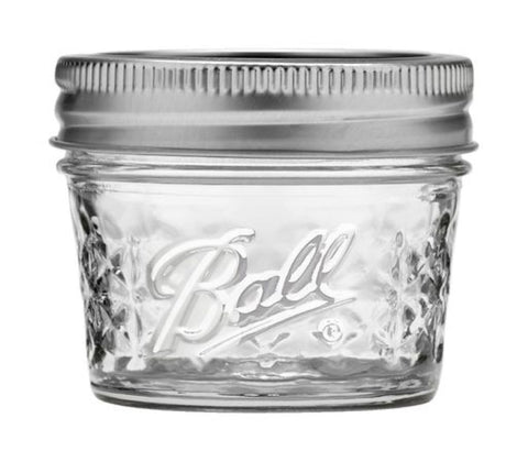 Ball jar lid close-up showing brushed-silver design for stylish storage.