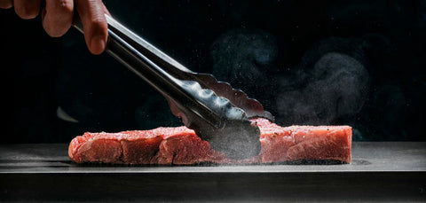 BALMUDA The Teppanyaki okonomiyaki flipping for even browning and dramatic presentation.