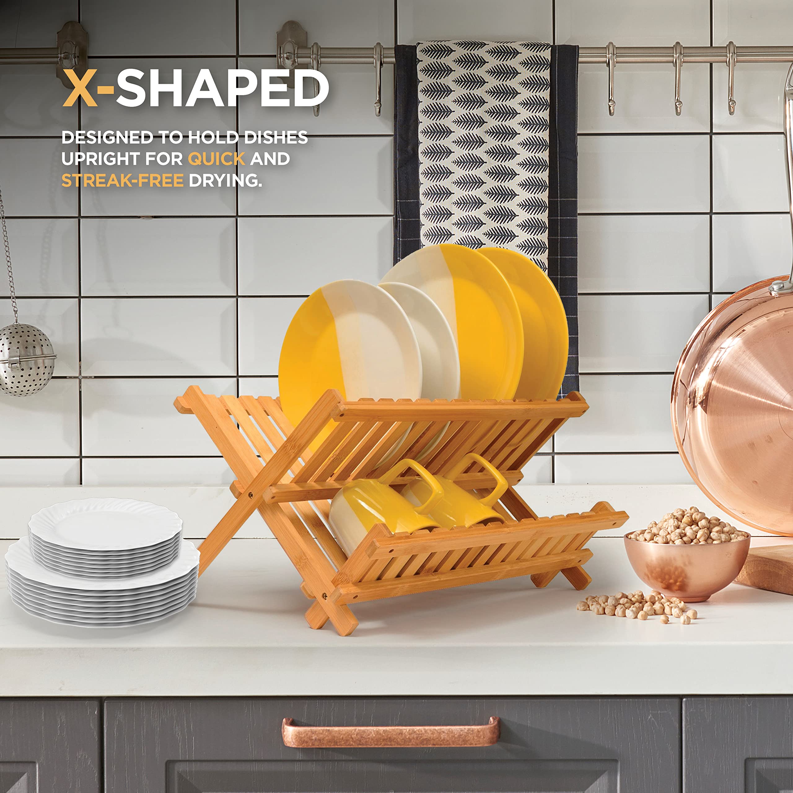 Bambüsi 2-tier rack holds plates neatly, promoting organized drying after meals.