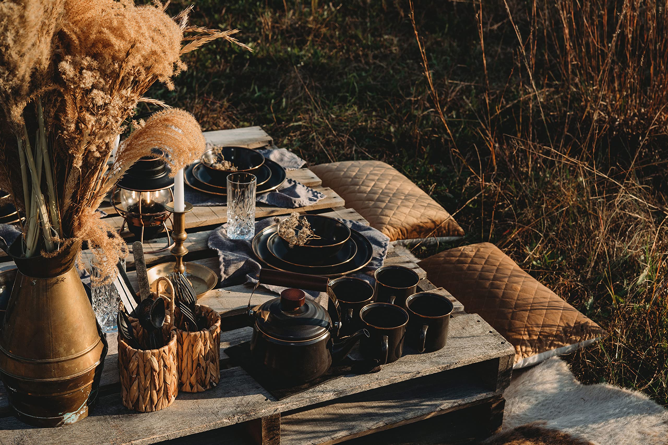 Barebones enamel cup in backyard scene suits casual gatherings.
